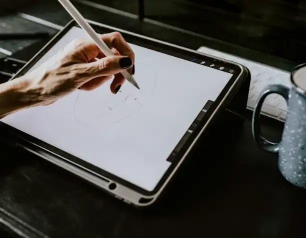 A hand drawing on a tablet