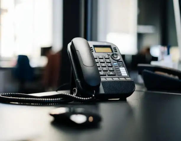 A desk phone in an office